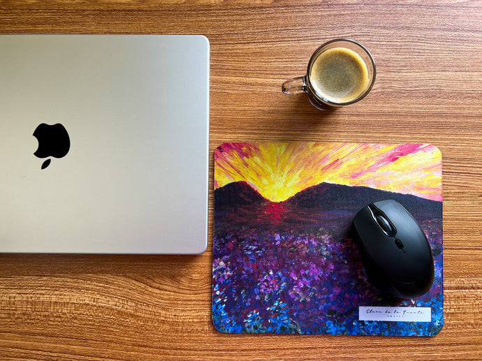 Montana fields art mousepad with an mouse in a office setting with a laptop and a coffee