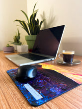 Load image into Gallery viewer, Montana fields art mousepad with an mouse on a home office with plants, a laptop and coffee
