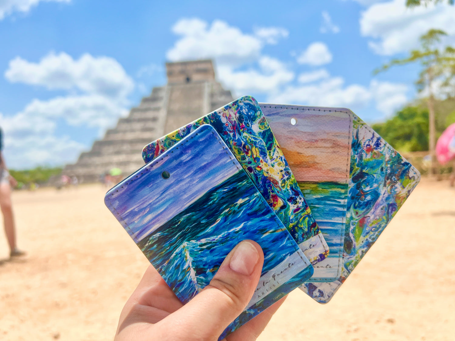 Four luggage tags from Clara de la Fuente by Chichen Itzá