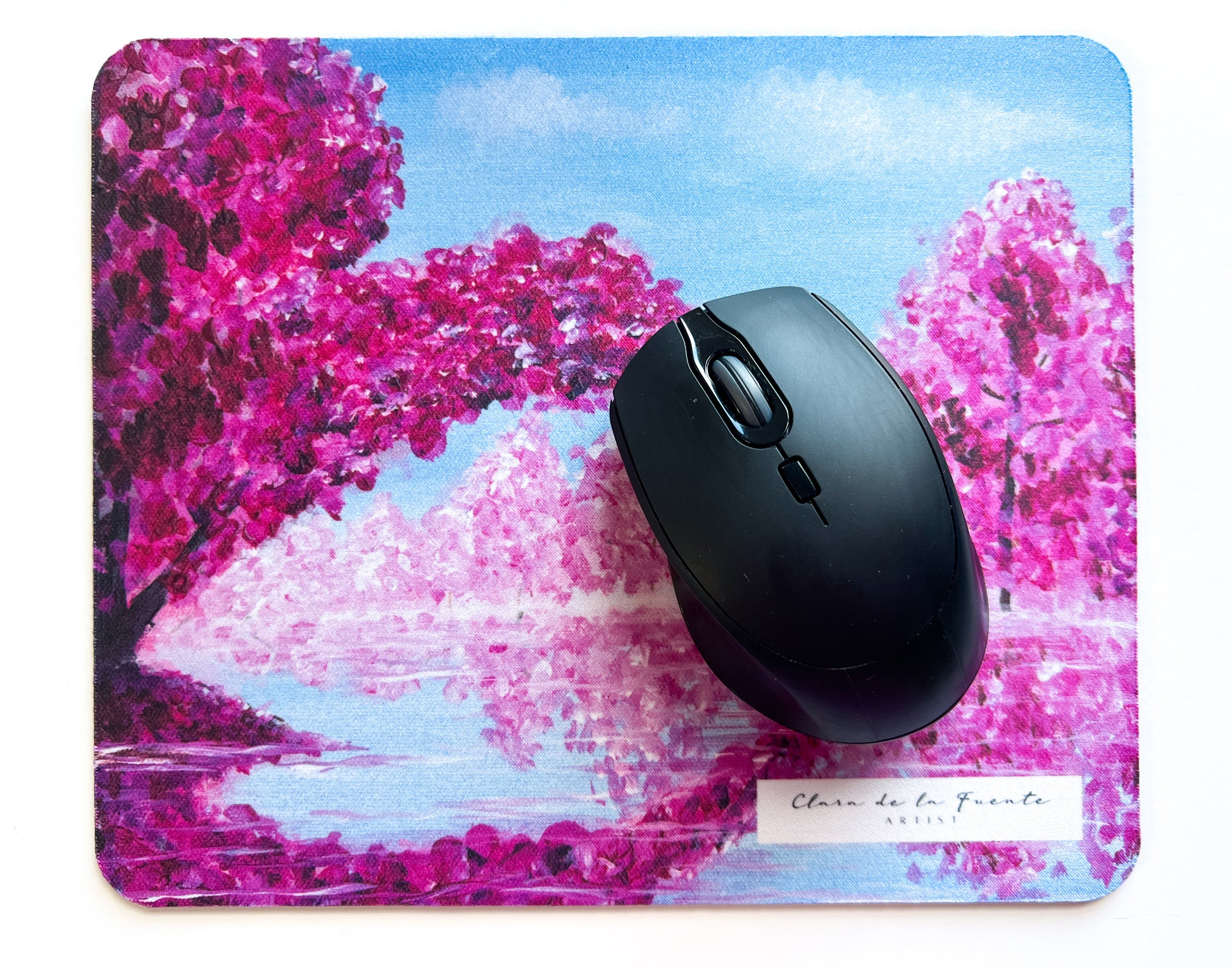 Cherry Blossom art mousepad with a mouse.